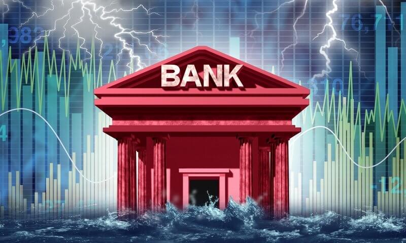 A bank building illuminated by lightning, set against a backdrop of a stock market graph, representing Capital Premium Financing.