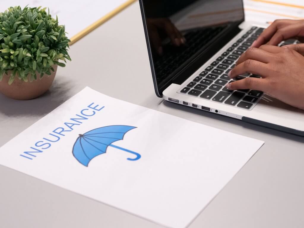A laptop displaying the Capital Premium Financing logo, symbolizing insurance solutions for modern financial needs.