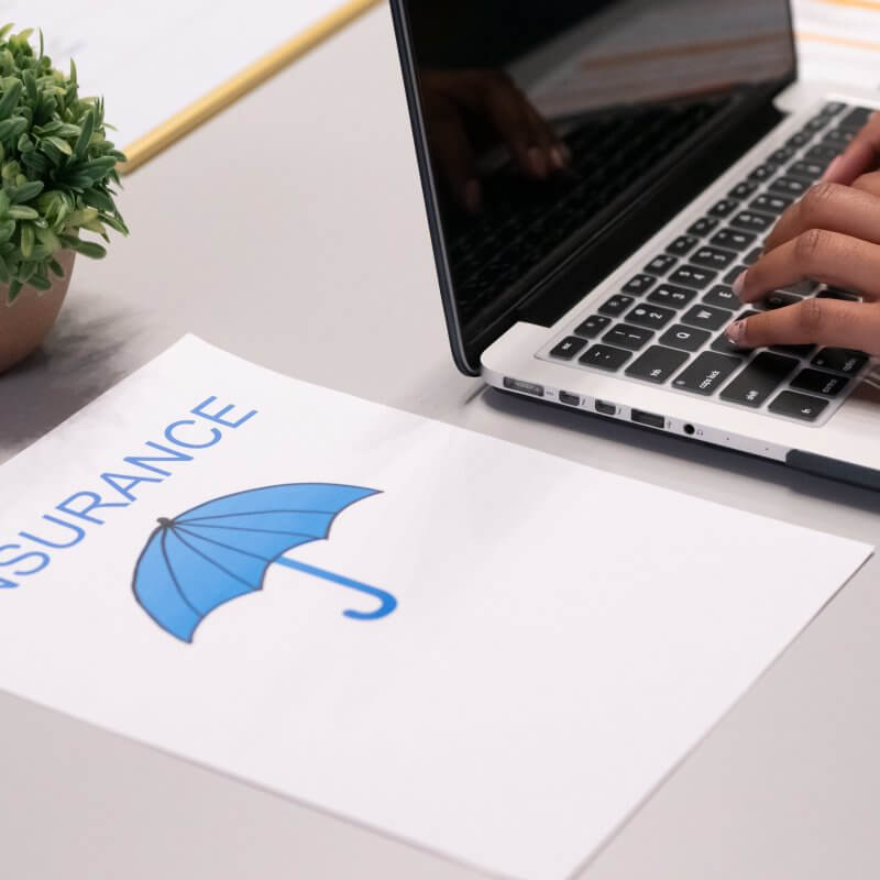 A laptop displaying the Capital Premium Financing logo, symbolizing insurance solutions for modern financial needs.